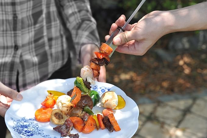 Jokari Pro Grade 6 in 1 Lighted Grill Set. All In One Industrial Strength Tool Includes Easy Grip Handle, Spatula, Adjustable Tongs, Knife Blade, Scraper, LED Flashlight, BBQ Skewers and Bottle Opener
