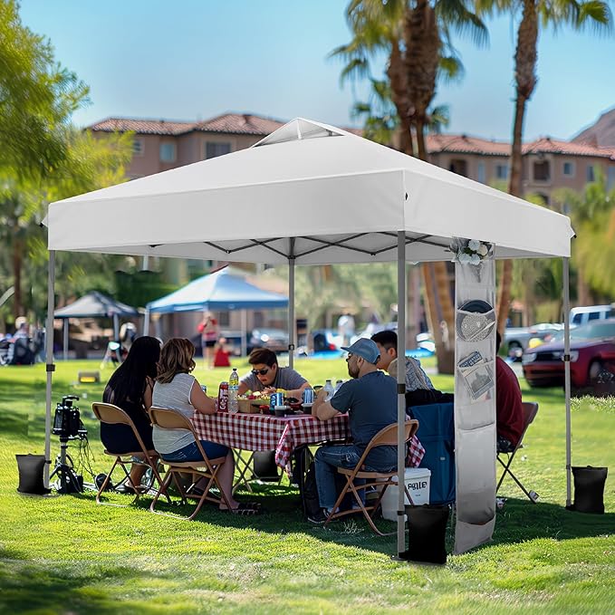 PHI VILLA 10x10 Pop Up Canopy Tent - One Push Setup, Instant Shade Tent with Vented Roof for Beach & Events - Includes Storage Bag, Sandbags, Stakes & Ropes (White)
