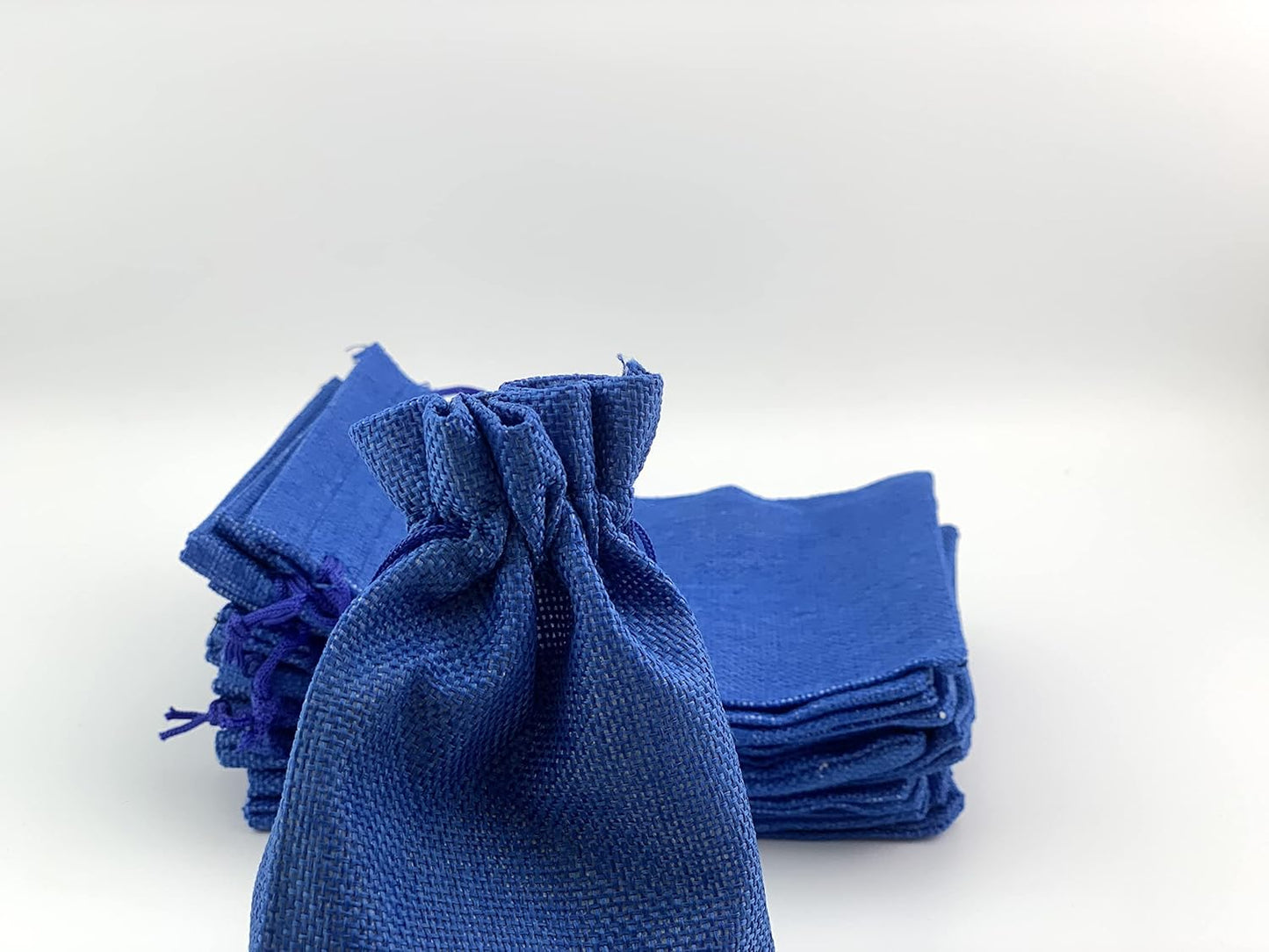 Palmhomee Pack of 25 Burlap Gift Bags with Drawstring Linen Jewelry Pouches Wedding Hessian Jute Bags for Birthday and Treat Pouches Party Wedding Favors Gift (7x9 Inch, Royal Blue)
