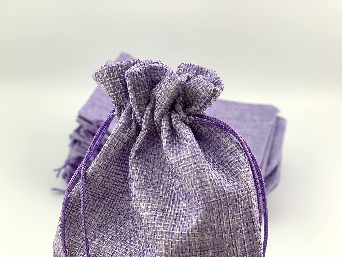 Palmhomee Pack of 25 Burlap Gift Bags with Drawstring Linen Jewelry Pouches Wedding Hessian Jute Bags for Birthday and Treat Pouches Party Wedding Favors Gift (7x9 Inch, Lavender)