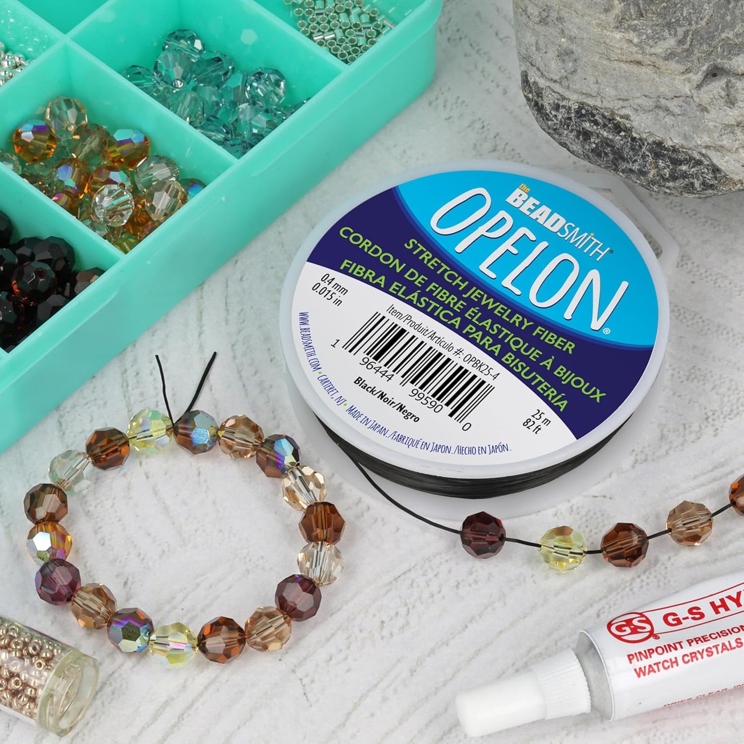 The Beadsmith Opelon Stretch Cord – Elastic Beading Fiber, Black, 0.4 mm Diameter, 25 Meters (82 ft) Spool