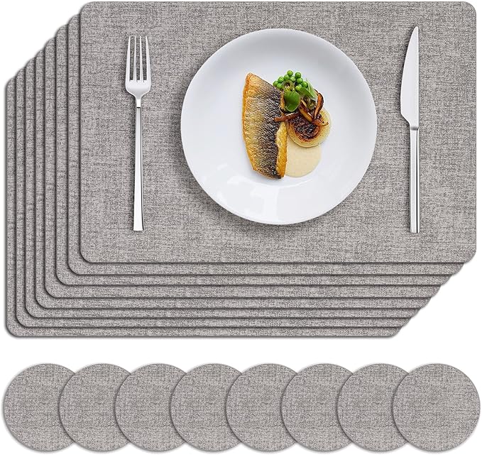 MOSAYT Placemats Set of 8, Heat Resistant Vinyl Place Mats with Coasters, Wipeable Washable 100% Waterproof Oil Proof Faux Leather Table Mats for Kitchen Dining Party Outdoor, 12" x 17", Light Grey
